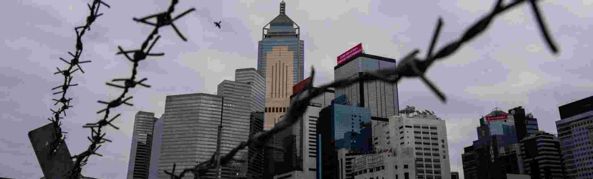 Hong Kong viewed through barbed wire.