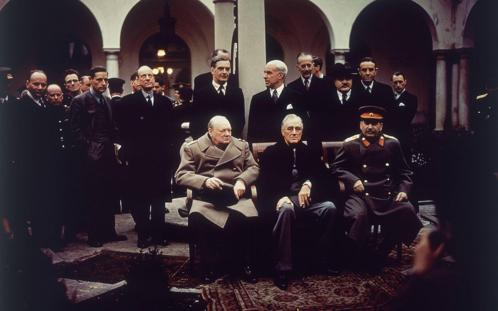 British Prime Minister Winston Churchill, US President Franklin Roosevelt and Soviet Dictator Joseph Stalin sit on the patio of Livadia Palace, Yalta, Crimea.