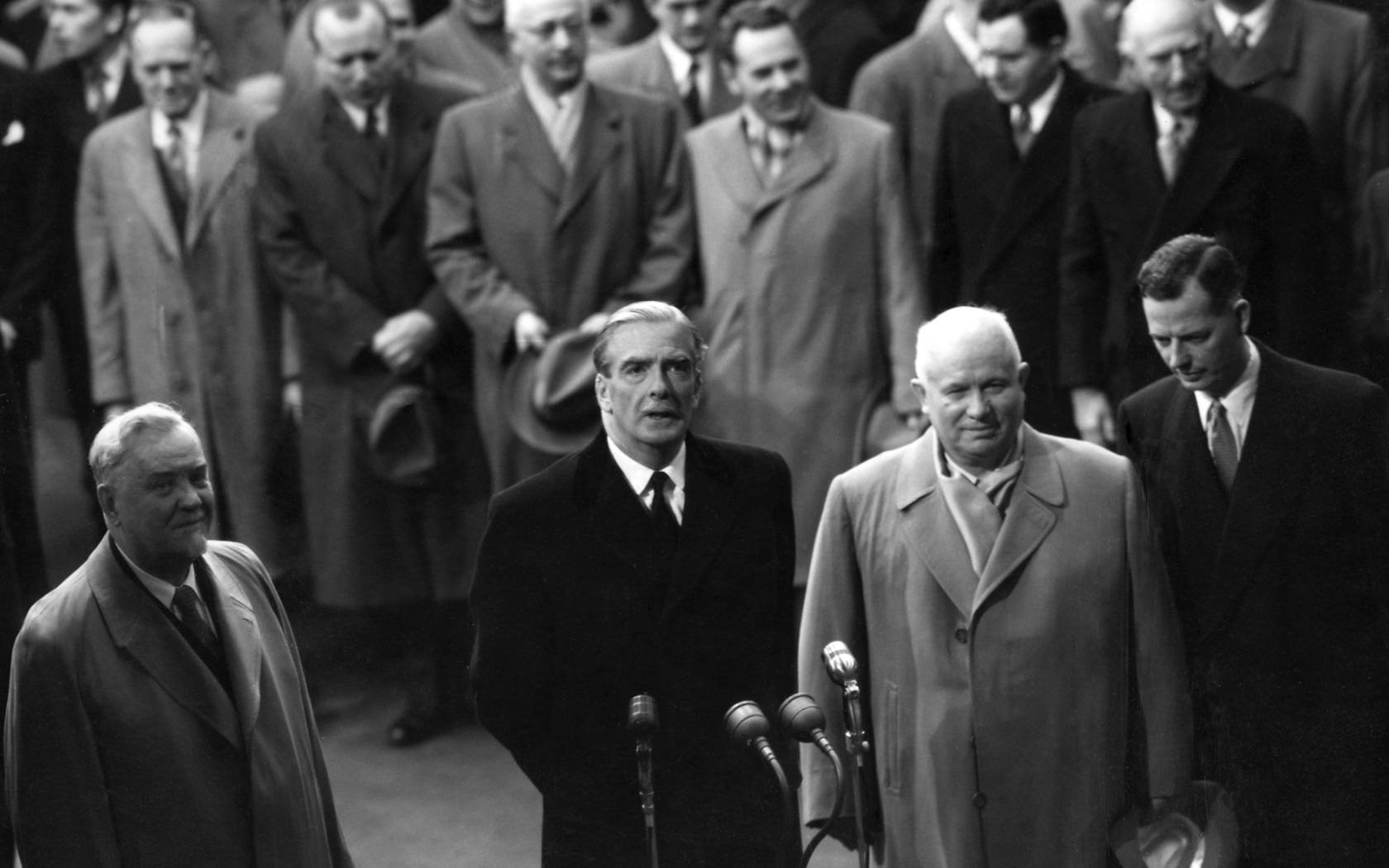 Prime Minister Sir Anthony Eden at Victoria Station in London to meet Marshal Nikolai Bulganin (left), chairman of the Council of Ministers of the USSR, and Nikita Krushchev, First Secretary of the Soviet Communist Party.