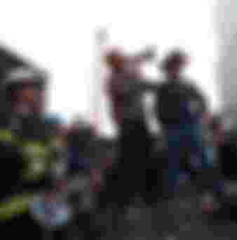 Standing atop rubble with retired New York City firefighter Bob Beckwith, President George W Bush rallies firefighters and rescue workers during an impromptu speech at the site of the collapsed World Trade Center. Image courtesy National Archives. Credit: Smith Collection/Gado/Getty Images.