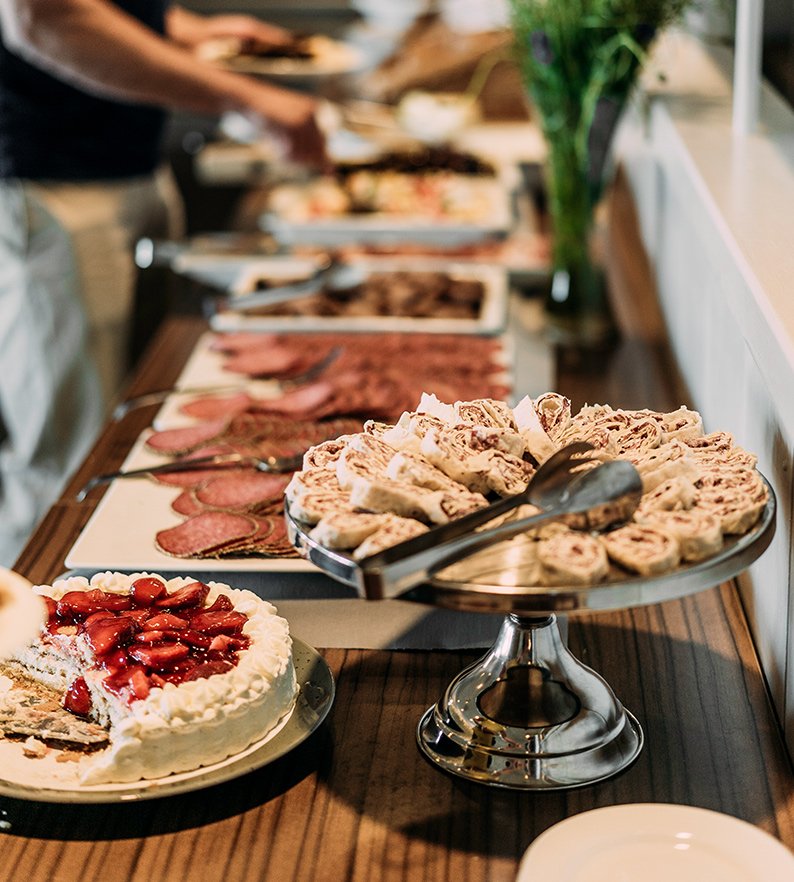 Midsummer buffet with appetizers and strawberry cake