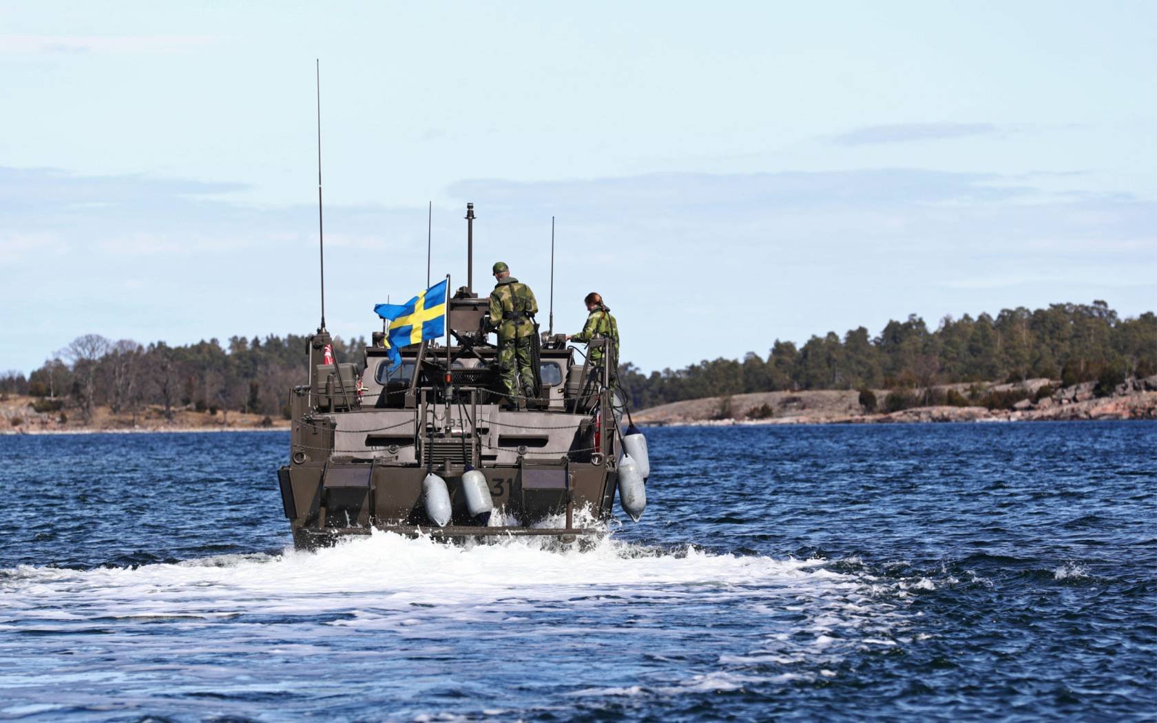 A Swedish ship partakes in a naval exercise by Götland.