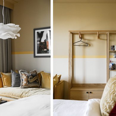 Soffa, säng och garderob i deluxerum