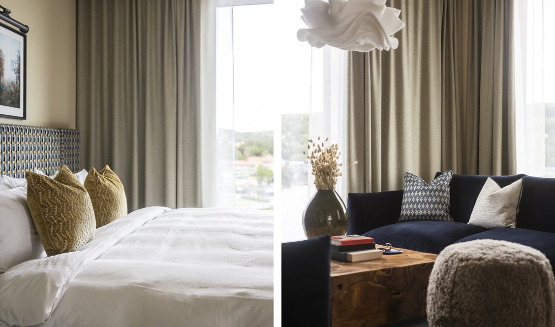 Säng och del av soffgrupp i stora sviten