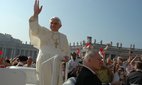 Pope Benedict XVI greets pilgrims attending a papal audience. Credit: Marion Kaplan / Alamy Stock Photo.