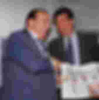 Robert Maxwell, left, celebrating the first edition of 'The European' in 1990 with Maurice Levy of Publicis. Credit: Michel Turpin / Sygma via Getty Images.