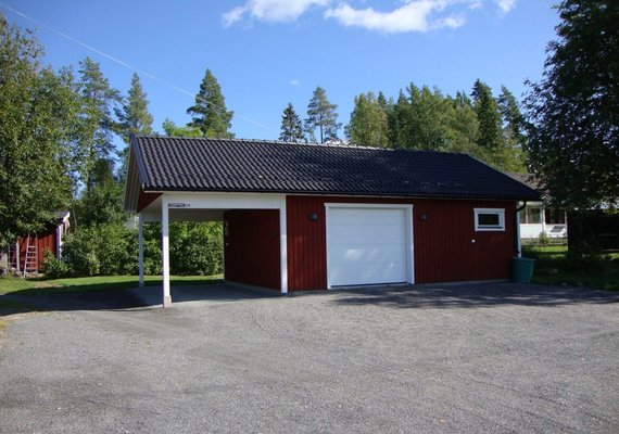 Small simple garage and carport with one window