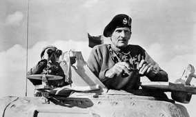 General Montgomery watches his tanks move up in North Africa.