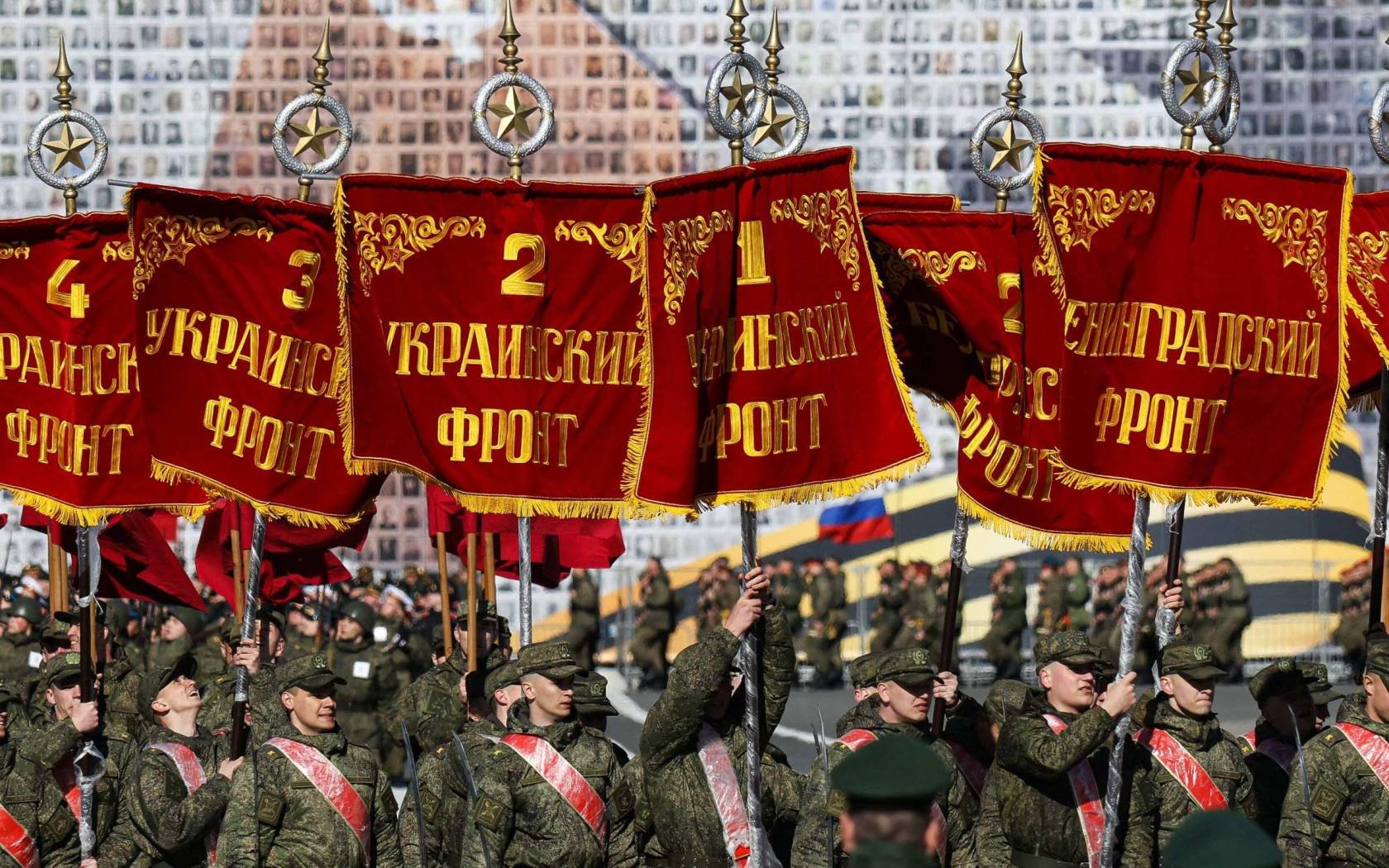 Russian servicemen carry a banner with the inscription "Ukrainian Front" during a rehearsal for the Victory Day Parade on Palace Square in St. Petersburg, on 17 January 2025.