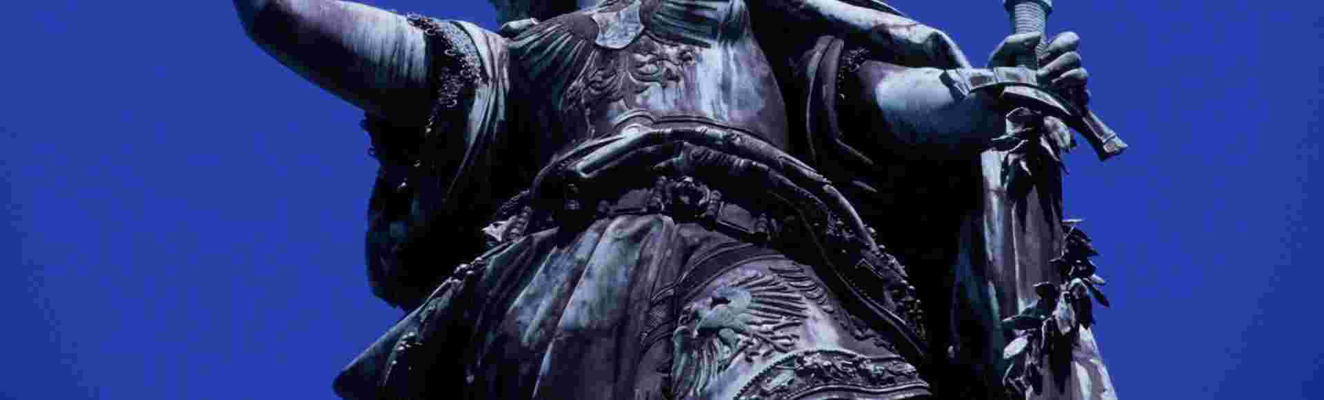 A statue of an angel holding an imperial crown aloft in Germany's Niederwald Monument.