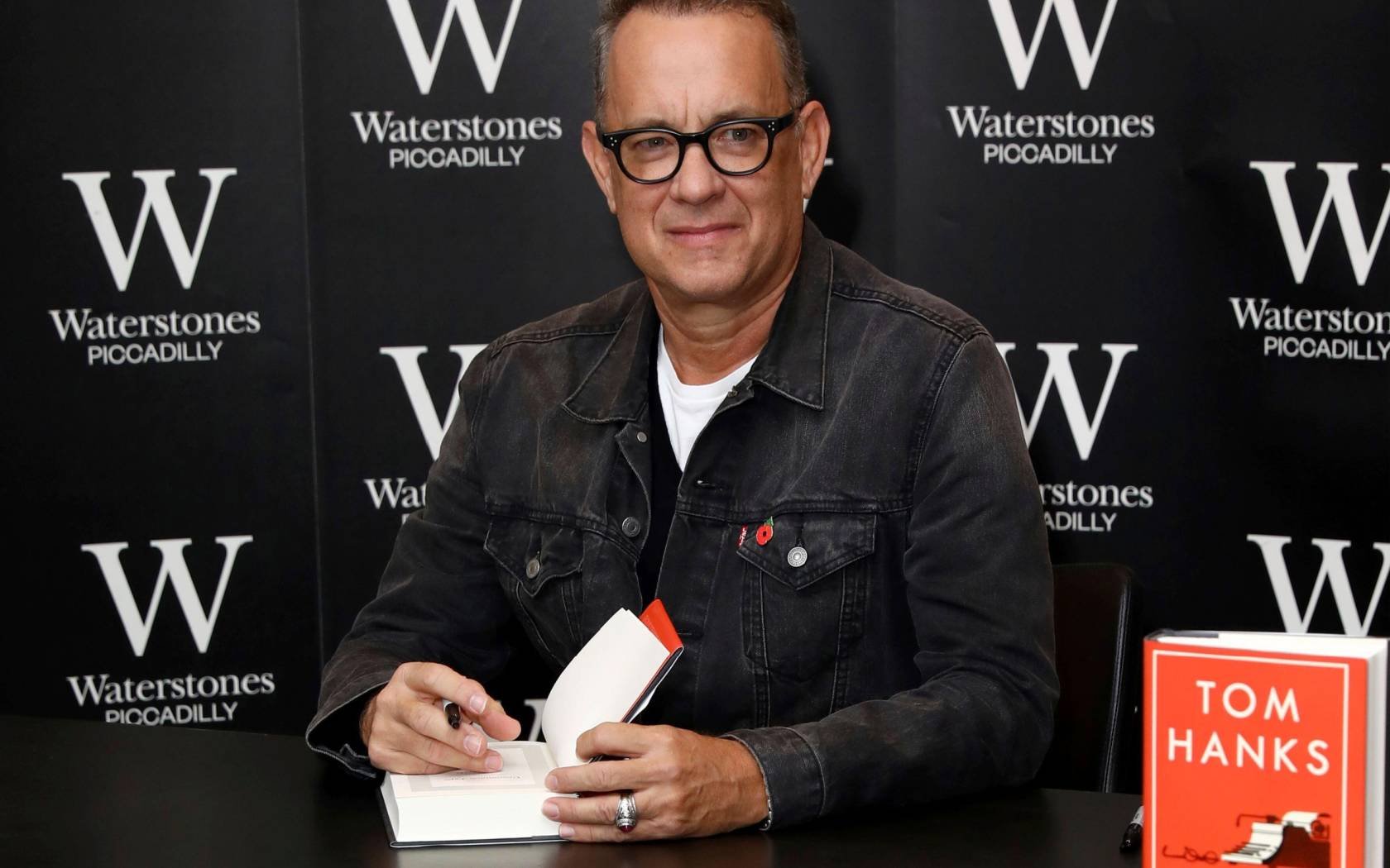 Tom Hanks at a book signing.