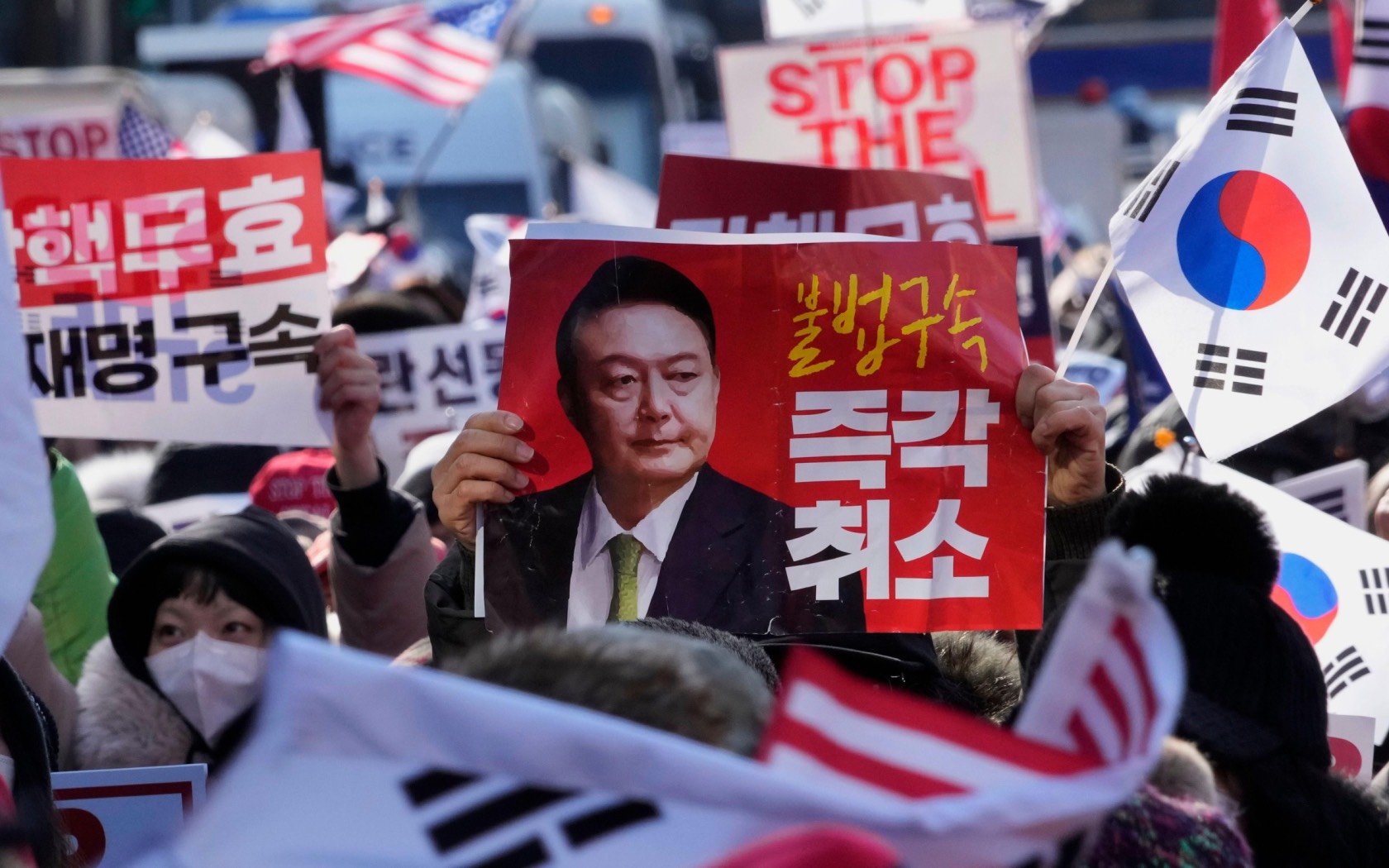 Supporters of impeached former South Korean President Yoon Suk Yeol at a rally in Seoul. Credit: Associated Press