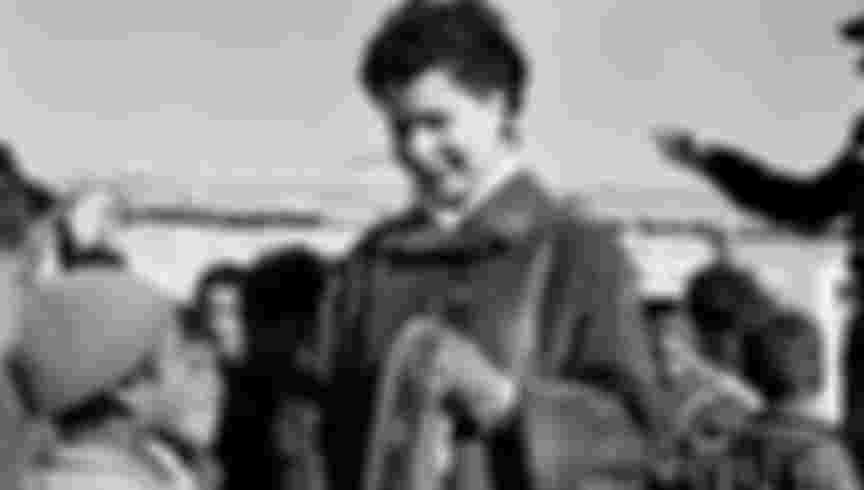 Nafissa Sid Cara talks with children in Algeria in the 1960s.