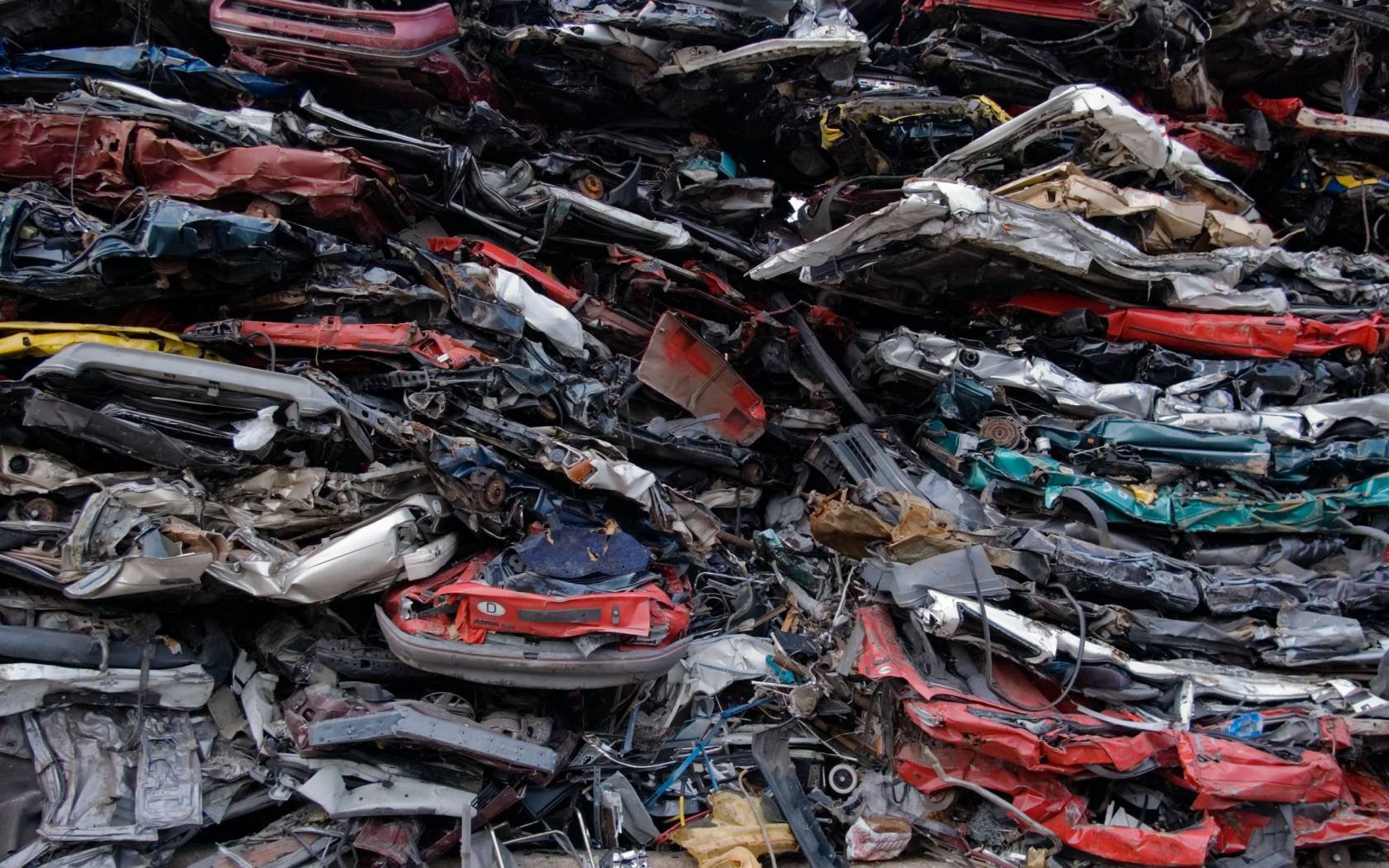 Cars piled up for scrap.