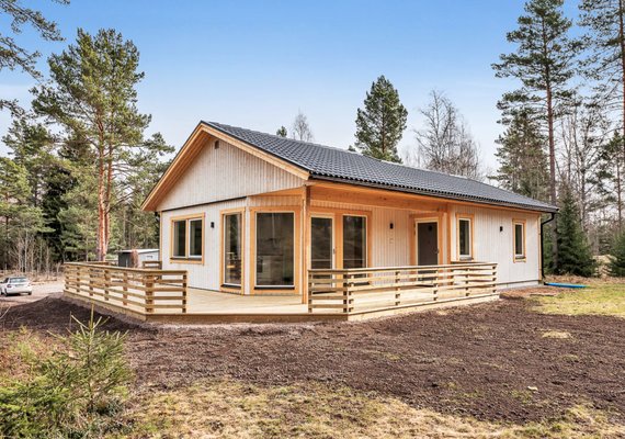 Natural color finish with surrounding wood porch
