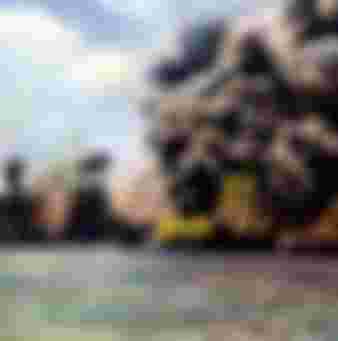 Three US battleships stricken during the Japanese attack on Pearl Harbor, 7 December 1941.