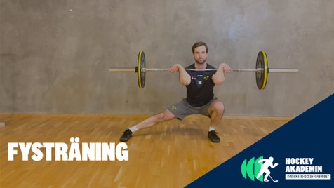 Fysövning: Laterala knäböj skivstång