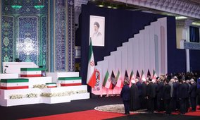 Foreign and domestic officials pay their respects before the coffins of the late Iranian Supreme Leader Ayatollah Ali Khamenei and members of his family in Tehran on 3 July. Credit: UPI