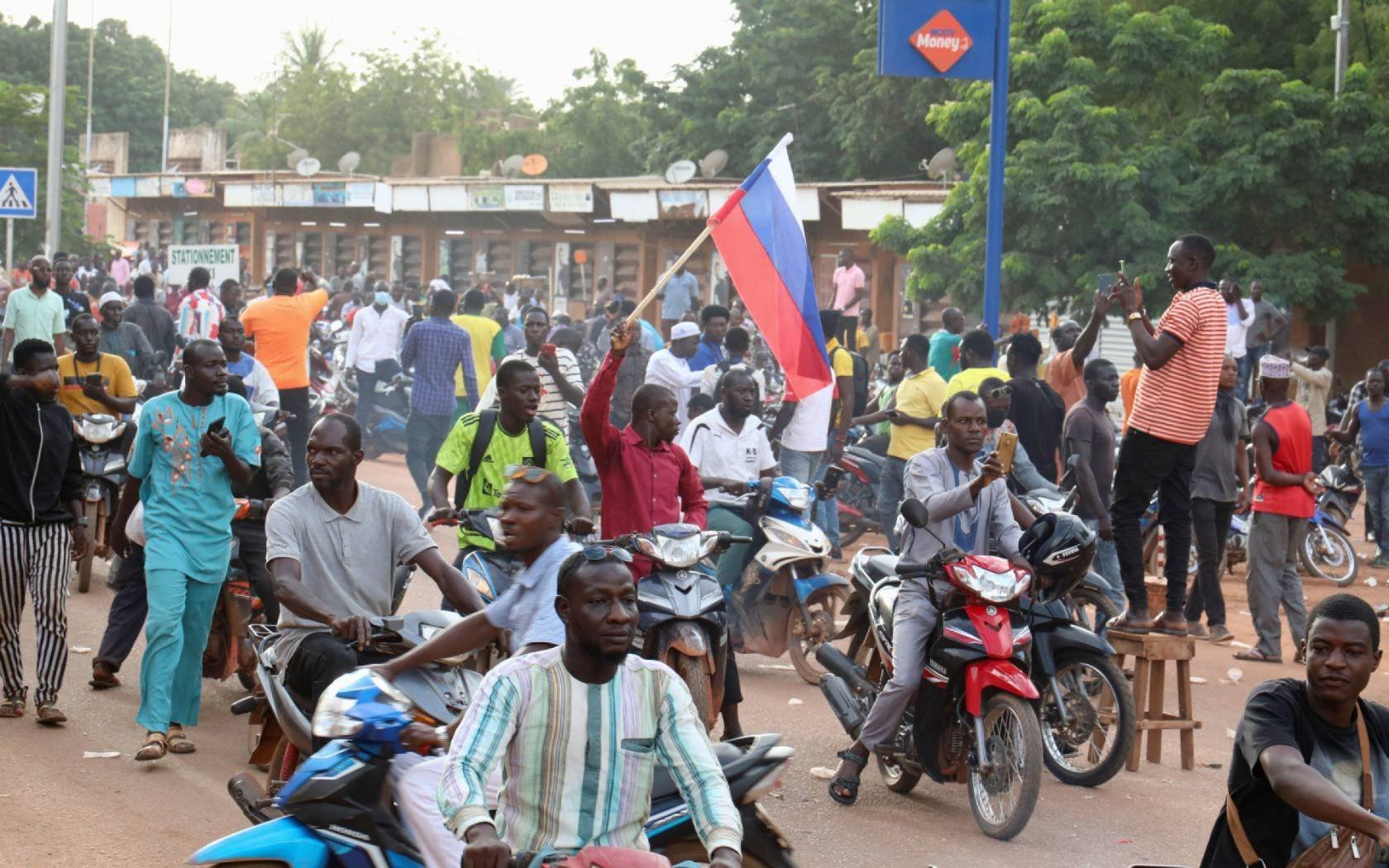 A man holds a Russian flag during a demonstration of supporters of Burkina Faso's self-declared new leader Ibrahim Traore, in Ouagadougou. Moscow is believed to have been involved in the coup.