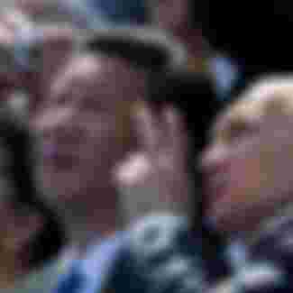 Russian President Vladimir Putin speaks to Chinese President Xi Jinping at the Victory Parade marking the 70th anniversary of the surrender of Nazi Germany in the Second World War.