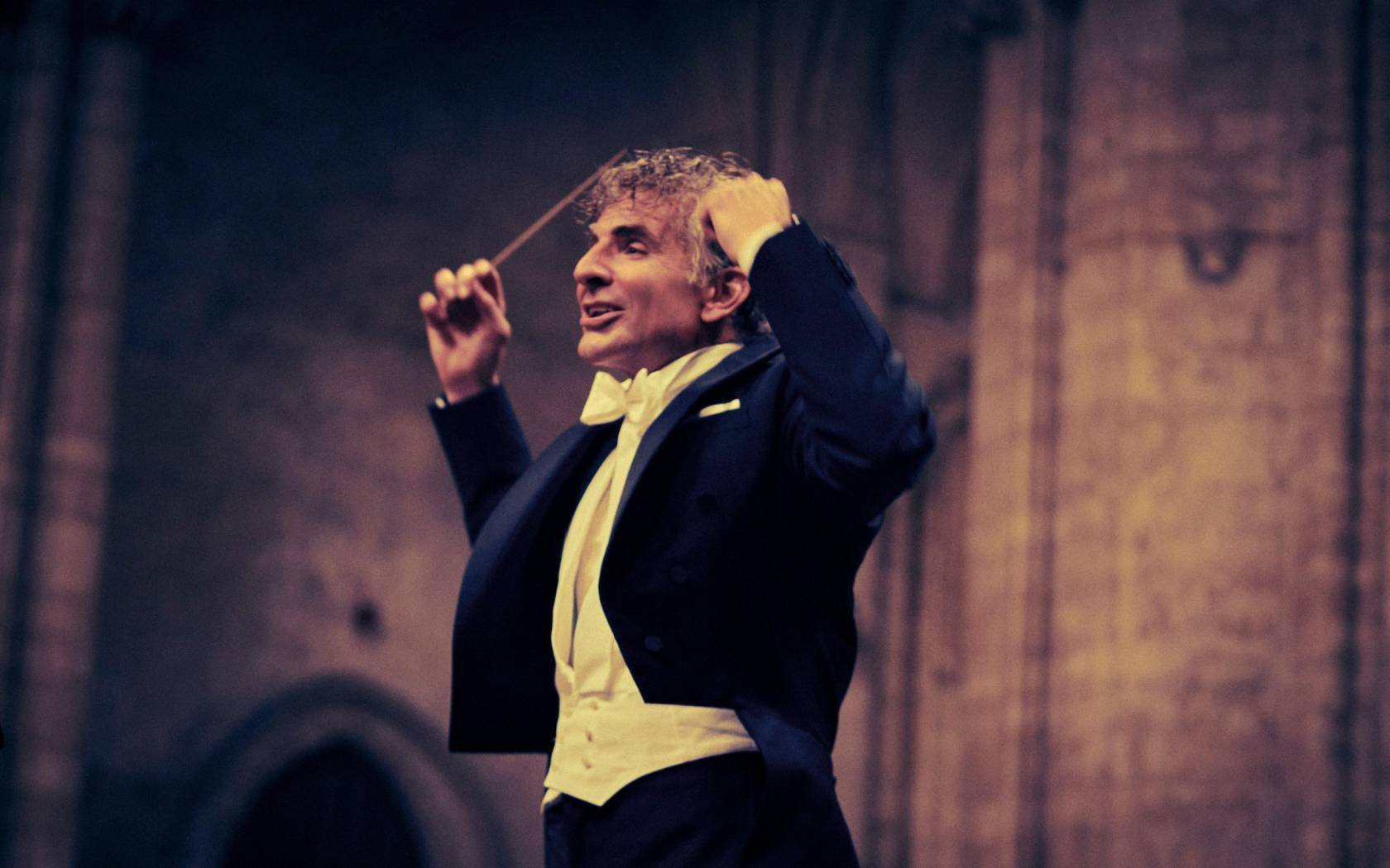 Bradley Cooper as Leonard Bernstein in Maestro.