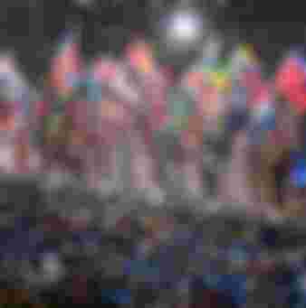 Athletes with flags from all nations make their way into the stadium as part of the 2012 London Olympic Summer Games. Credit: AMA/Corbis via Getty Images