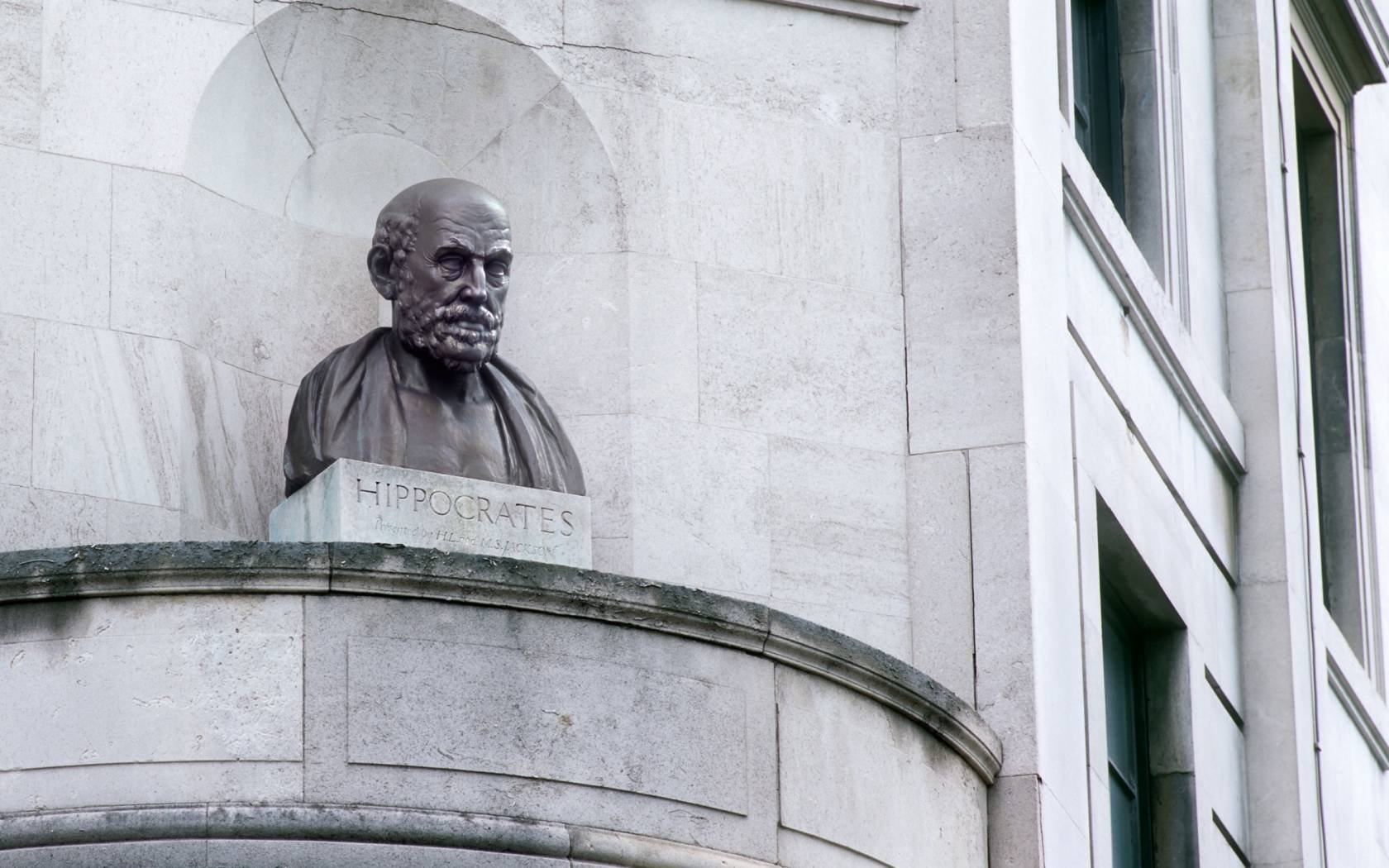 A statue of Hippocrates in London.