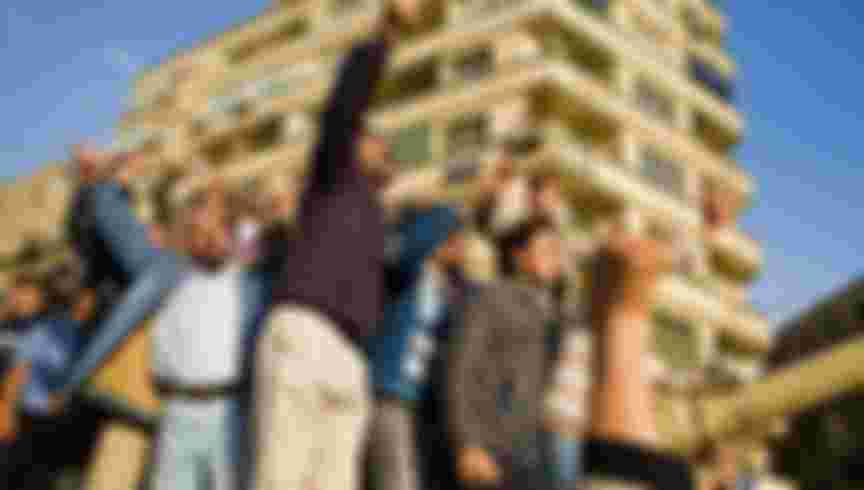 Anti-government protesters celebrate on a tank in Tahrir Square, Cairo, on the first full day of the square's occupation in January 2011.