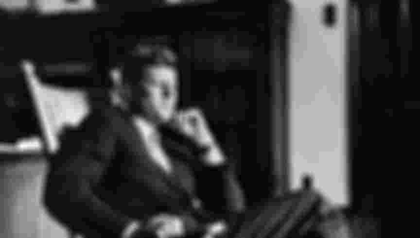 John F. Kennedy sitting in his signature rocking chair in the Oval Office. Creidt: © CORBIS/Corbis via Getty Images.