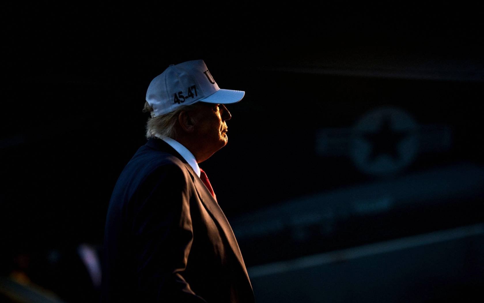 President Donald Trump inside the hangar bay of Nimitz-class aircraft carrier USS George Washington in Yokosuka, Japan on 28 October 2025.