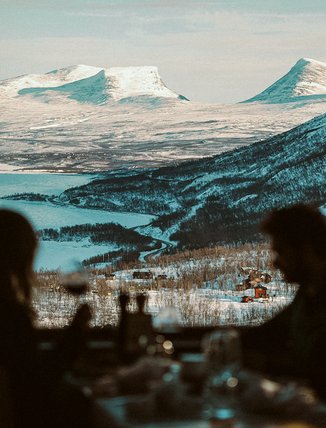 a couple eating at Lapporten restaurant