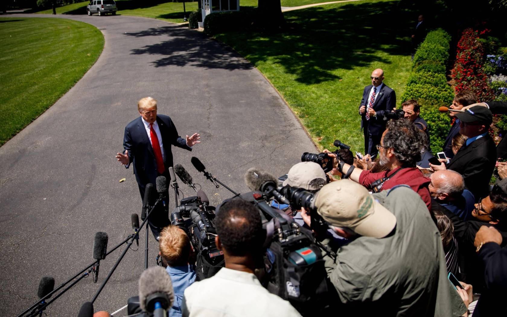 Donald Trump addresses reporters about US policy in the Middle East in 2019.