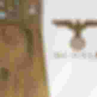 A large Sèvres presentation plate celebrating Nazism's alleged debt to Charlemagne.