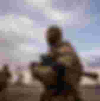 Russian troops on the Russian/Ukrainian border in 2015. Credit: Tommy E Trenchard / Alamy Stock Photo