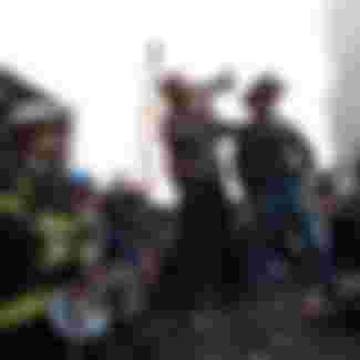 Standing atop rubble with retired New York City firefighter Bob Beckwith, President George W Bush rallies firefighters and rescue workers during an impromptu speech at the site of the collapsed World Trade Center. Image courtesy National Archives. Credit: Smith Collection/Gado/Getty Images.