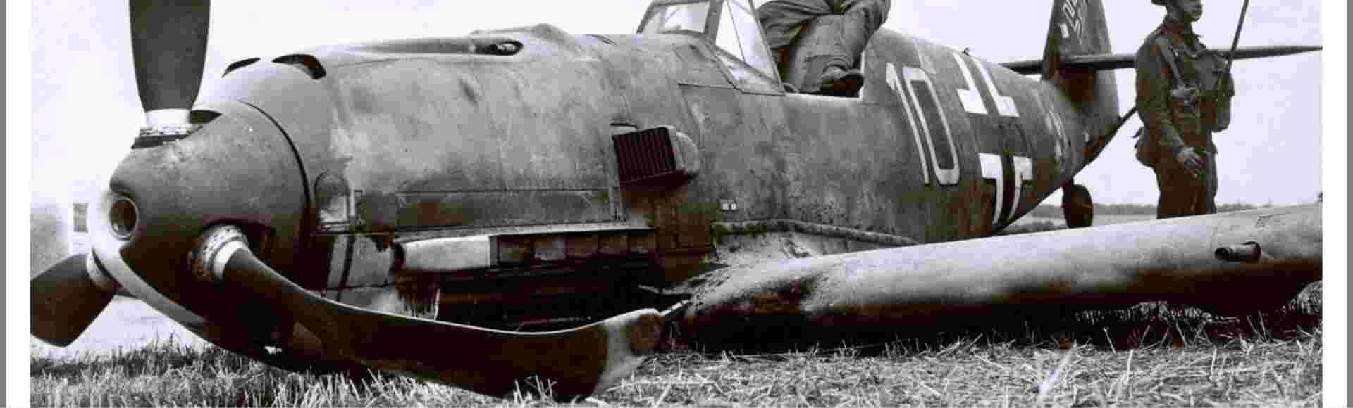 British Soldiers pose with Nazi Luftwaffe Messerschmitt Bf 109E-4 which crash-landed at East Langdon in Kent, 24 August 1940.