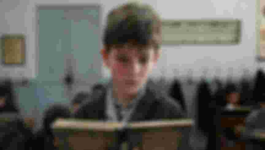 A still from the Italian film adaptation of Le premier homme, Il Primo Uomo. Credit: Photo 12 / Alamy Stock Photo.