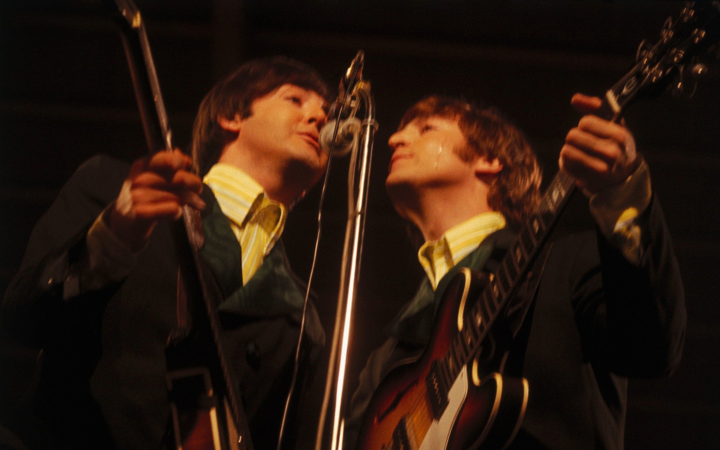 Paul McCartney and John Lennon performing live in Munich in 1966