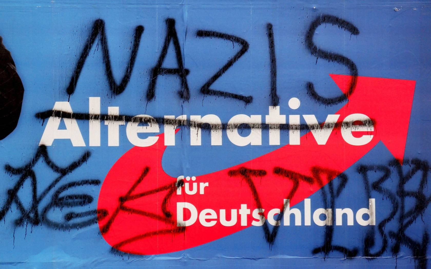 The term 'Nazi' sprayed on an election poster for the AfD (Alternative für Deutschland).