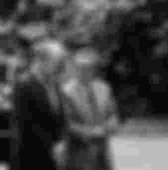 President Gerald Ford and U.S. Secretary of State Henry Kissinger conversing in the grounds of the White House in 1974.