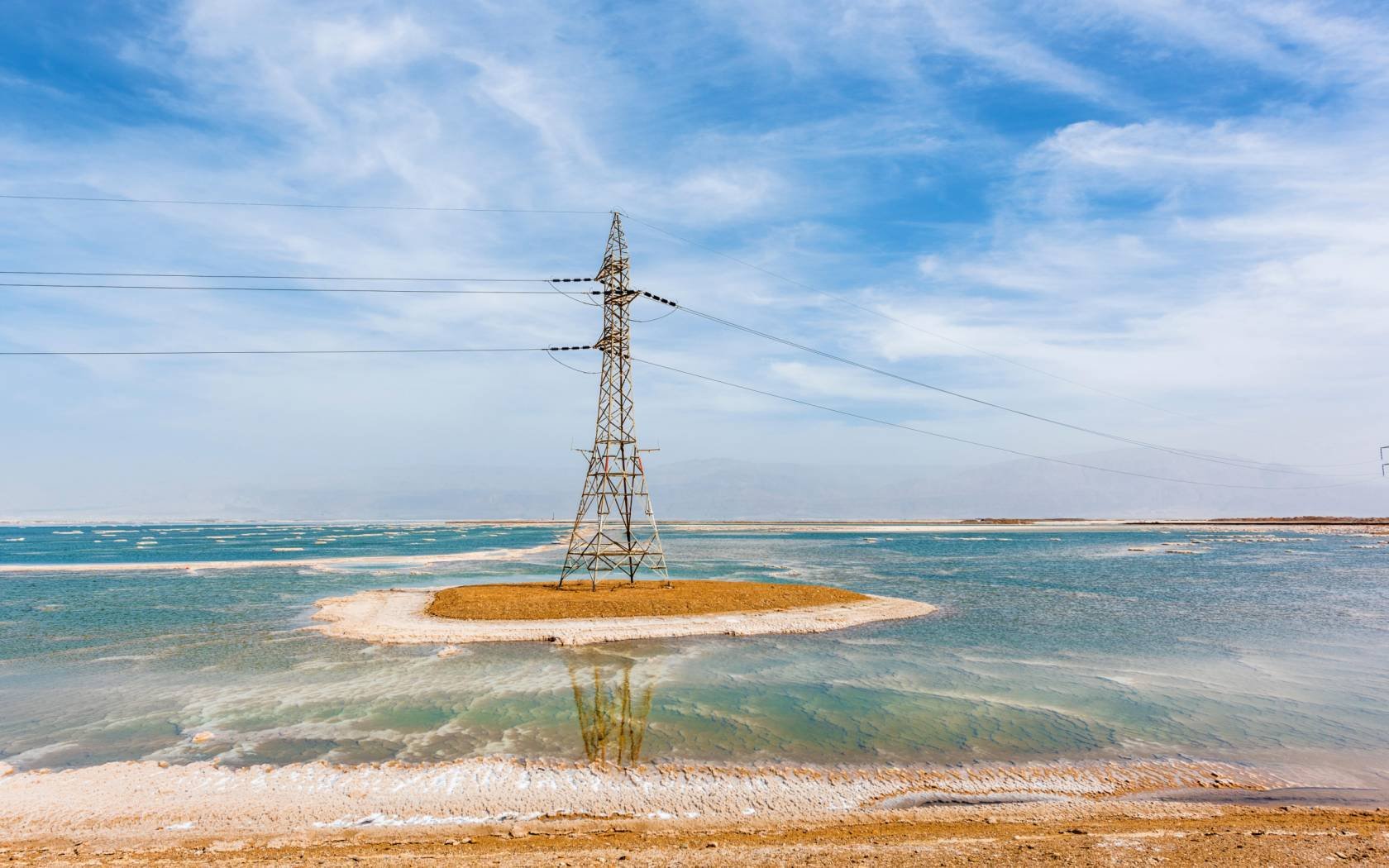 Power post at the Dead Sea, Israel.
