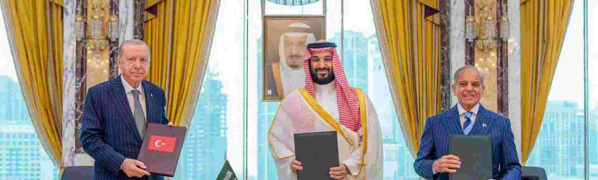 Saudi Crown Prince Mohammed bin Salman, Turkish President Recep Tayyip Erdogan, and Pakistani Prime Minister Shehbaz Sharif attend the signing ceremony of the Mecca Joint Defense Agreement in Mecca on August 7, 2026.