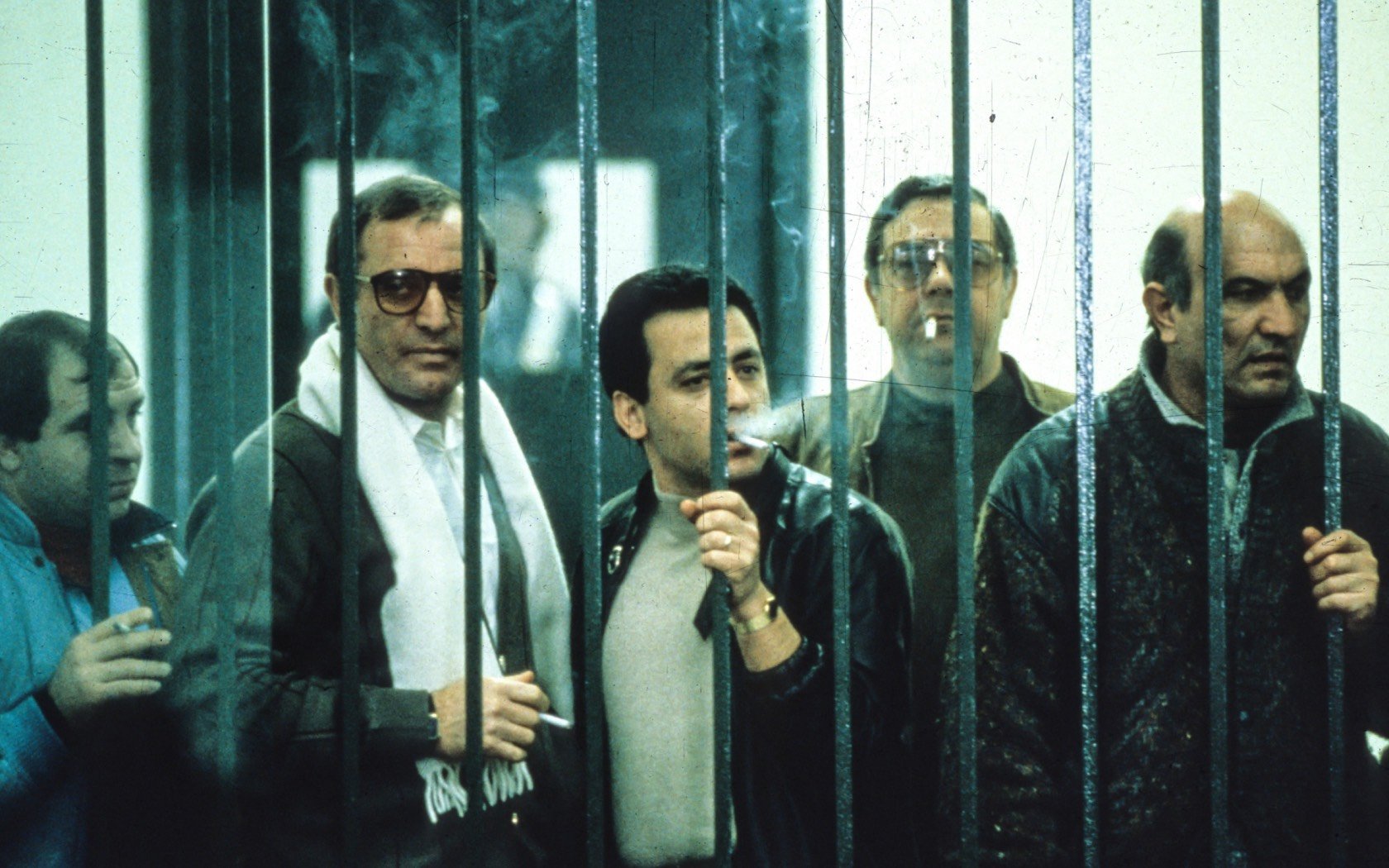Defendants behind bars during a Mafia trial in Palermo, 1986. Credit: Universal Images Group North America LLC