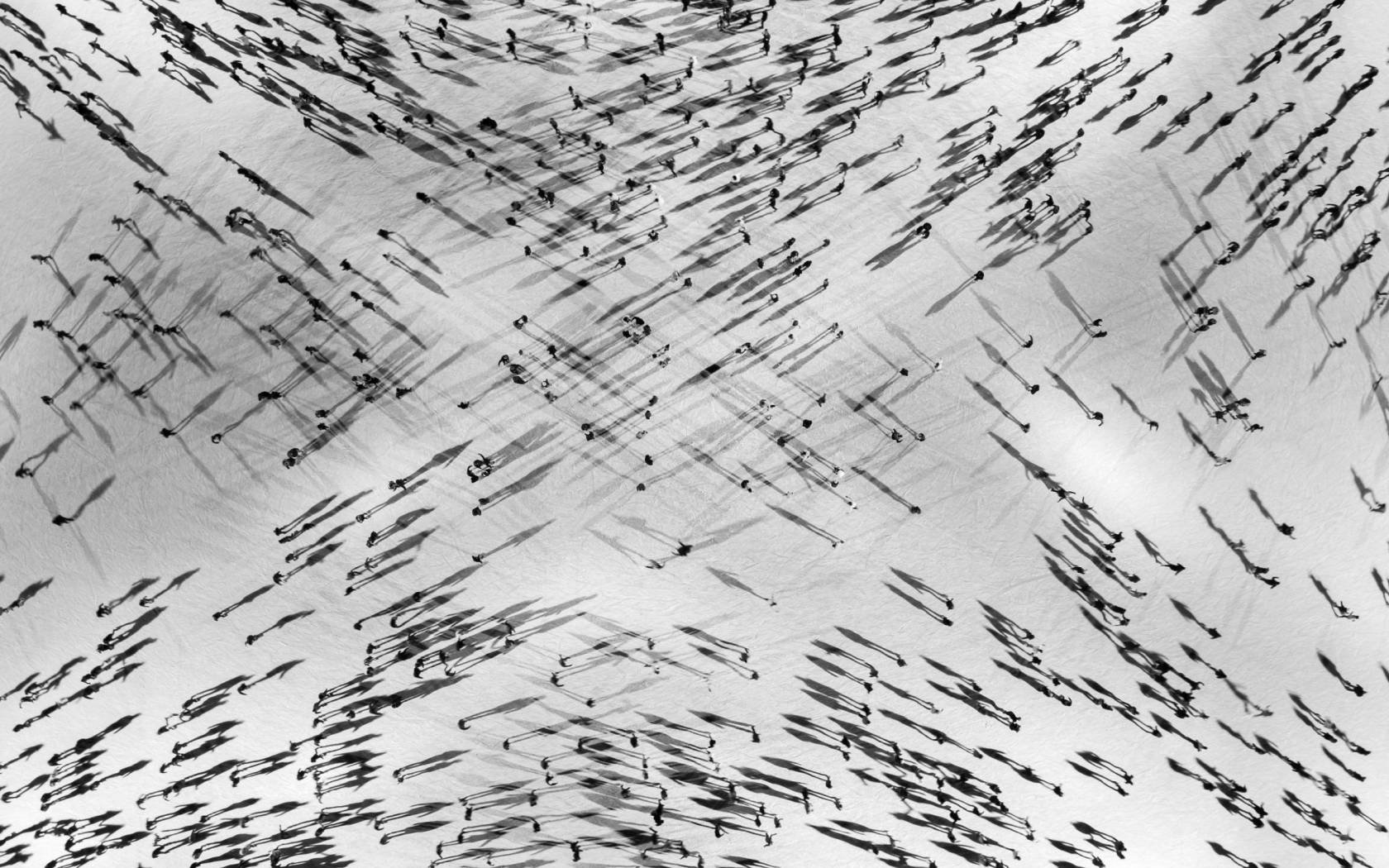 Aerial drone view of people skating.