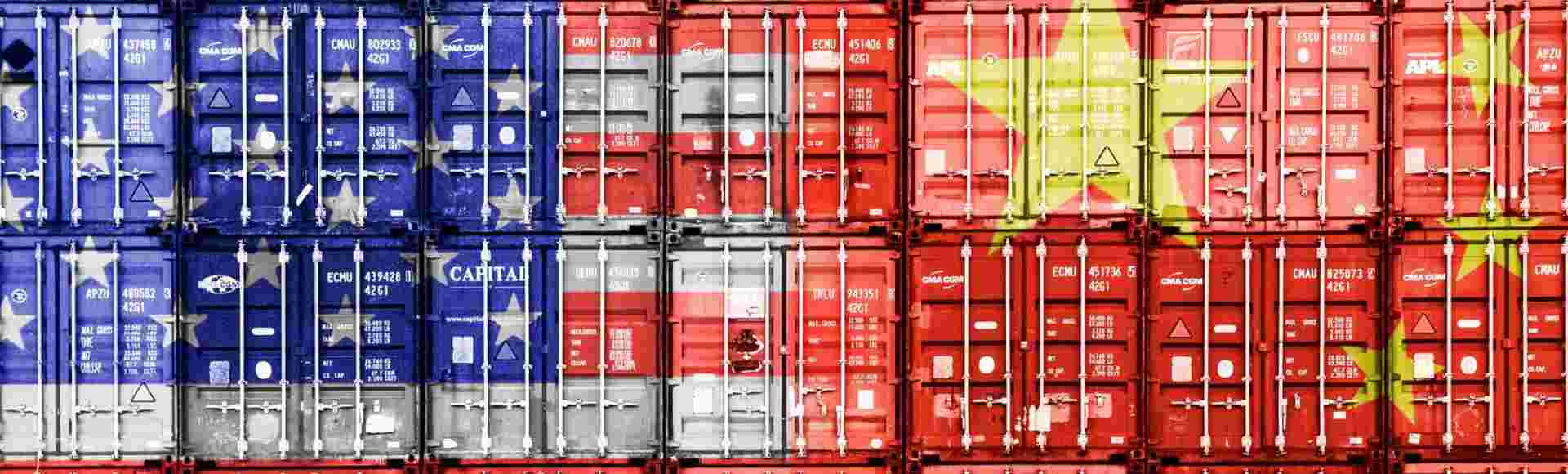 The US and Chinese flags on stacked containers.