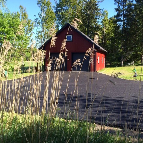 Nature integrated loft style barn garage