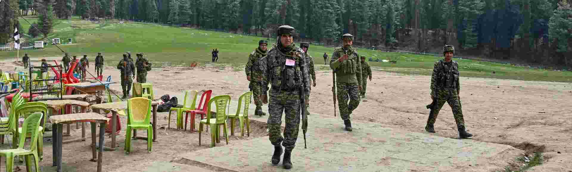 Indian security personnel inspect the site of a militant attack on tourists at Pahalgam in Indian-controlled Kashmir.