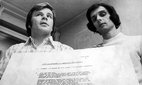 Swedish Journalists Jan Guillou and Peter Bratt at the periodical 'Folket I Bild/Kulturfront' hold a document of secret intelligence reports revealing the IB affair. IB was a Swedish secret intelligence organisation dealing with the registration of citizens' political views, mainly communists. Credit: TT News Agency