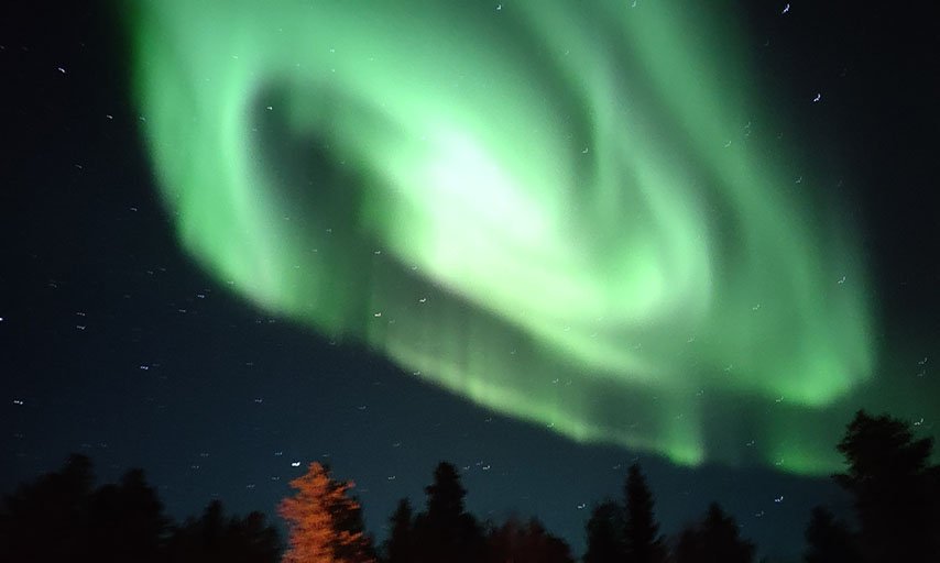 Aurora at arctic dogsled adventure