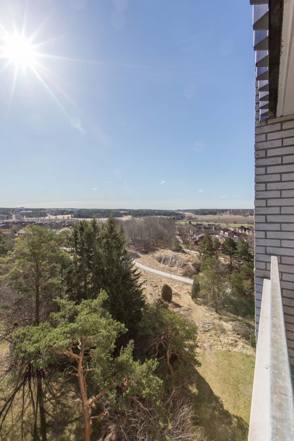 View from balcony of a green landscape.